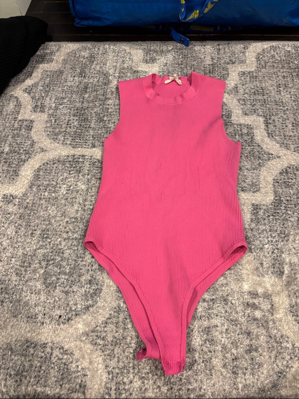 Ribbed Sleeveless Pink Bodysuit with High Neck